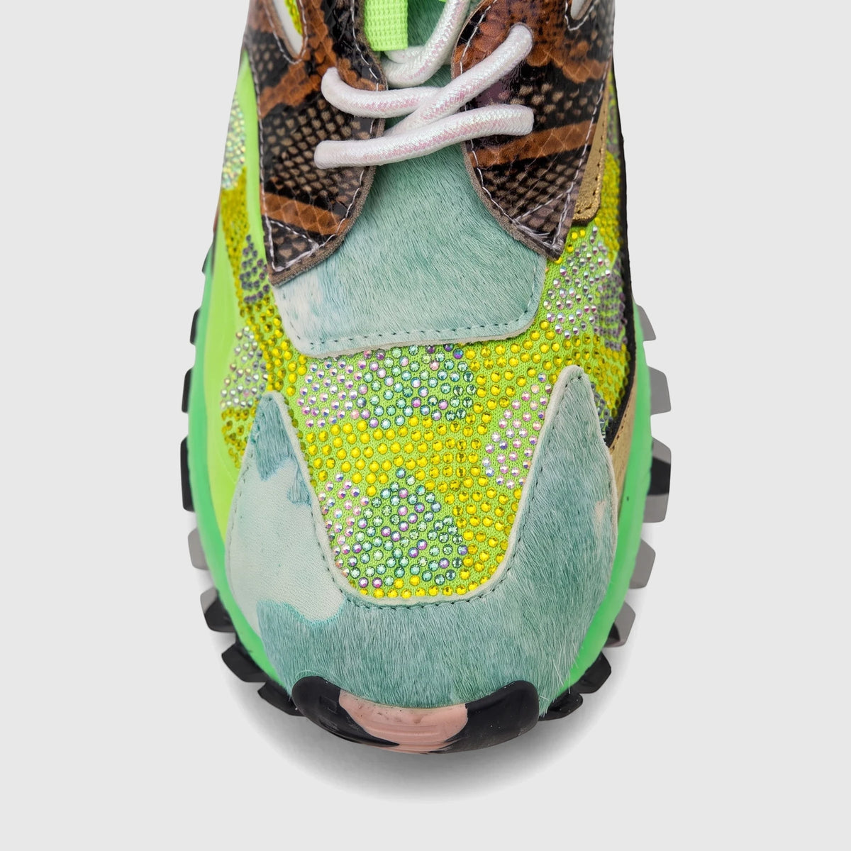 Morbido Ladies Leather Sneaker in green multi, featuring snakeskin print, rhinestones, and fur-like details, frontal view.