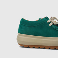 Morbido Ladies Leather Sneaker Green HAS-001, featuring a green suede upper and a thick beige platform sole, captured from a