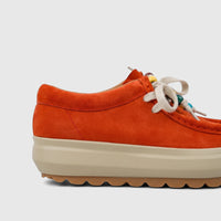 Morbido Ladies Leather Sneaker in vibrant orange suede with a thick beige platform sole and off-white laces with colorful