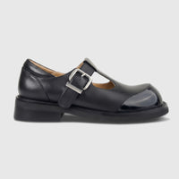 Morbido Ladies Leather T-Bar Chunky Sole shoe in black, with a silver buckle and patent toe cap, shown in a profile view.