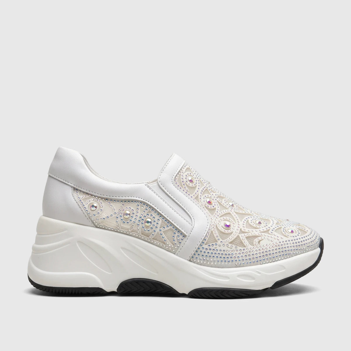 Morbido Ladies White Leather Sneaker with crystal embellishments and a chunky white sole, presented in a side view.