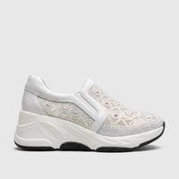 Morbido Ladies White Leather Sneaker with crystal embellishments and a chunky white sole, presented in a side view.