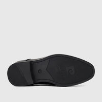 PC Boys Black Dress Lace Up shoes, featuring a detailed view of the textured rubber sole with prominent Pierre Cardin
