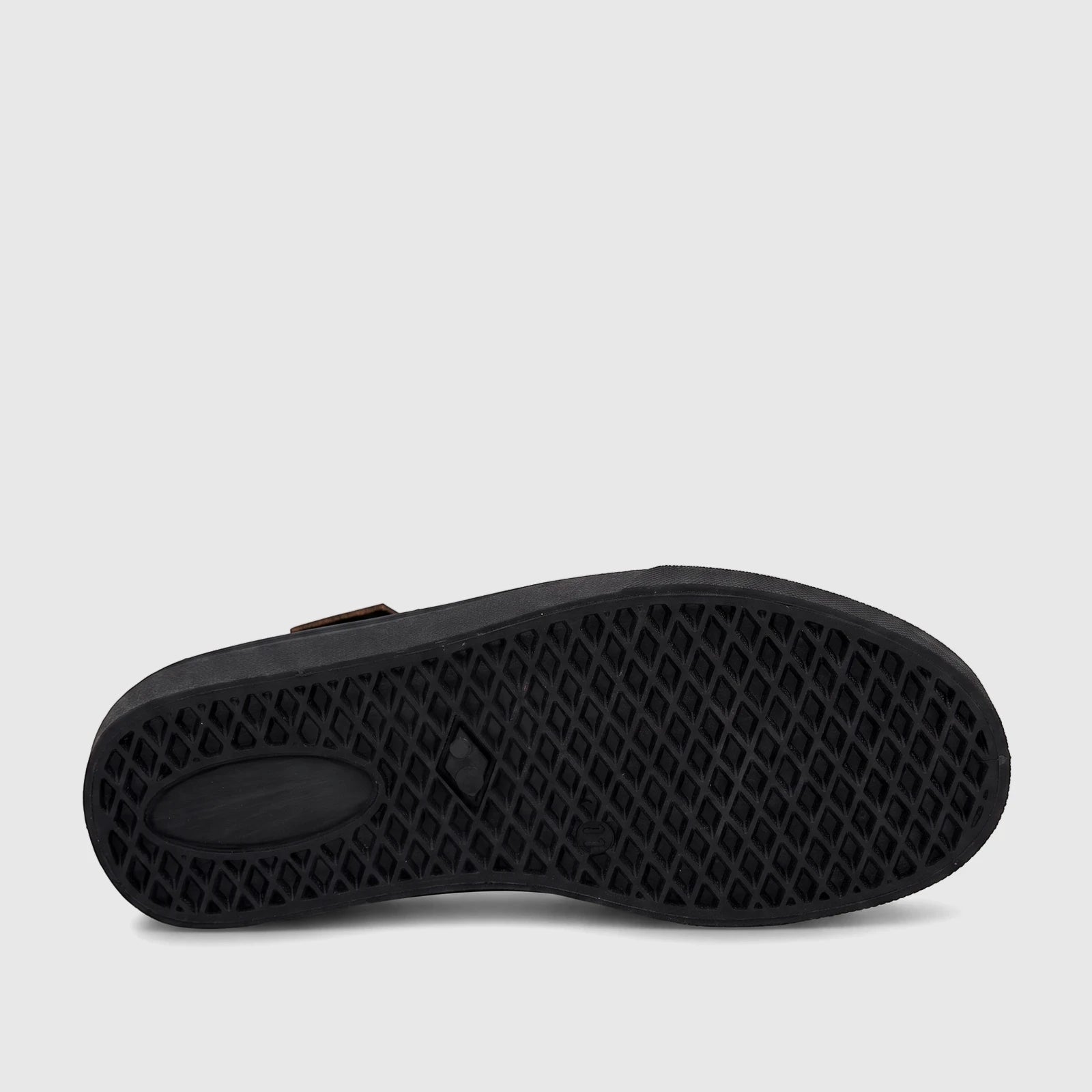 PC Boys black casual slip-on shoe, size UK9 to UK1, featuring a textured diamond-patterned sole, captured from the bottom.