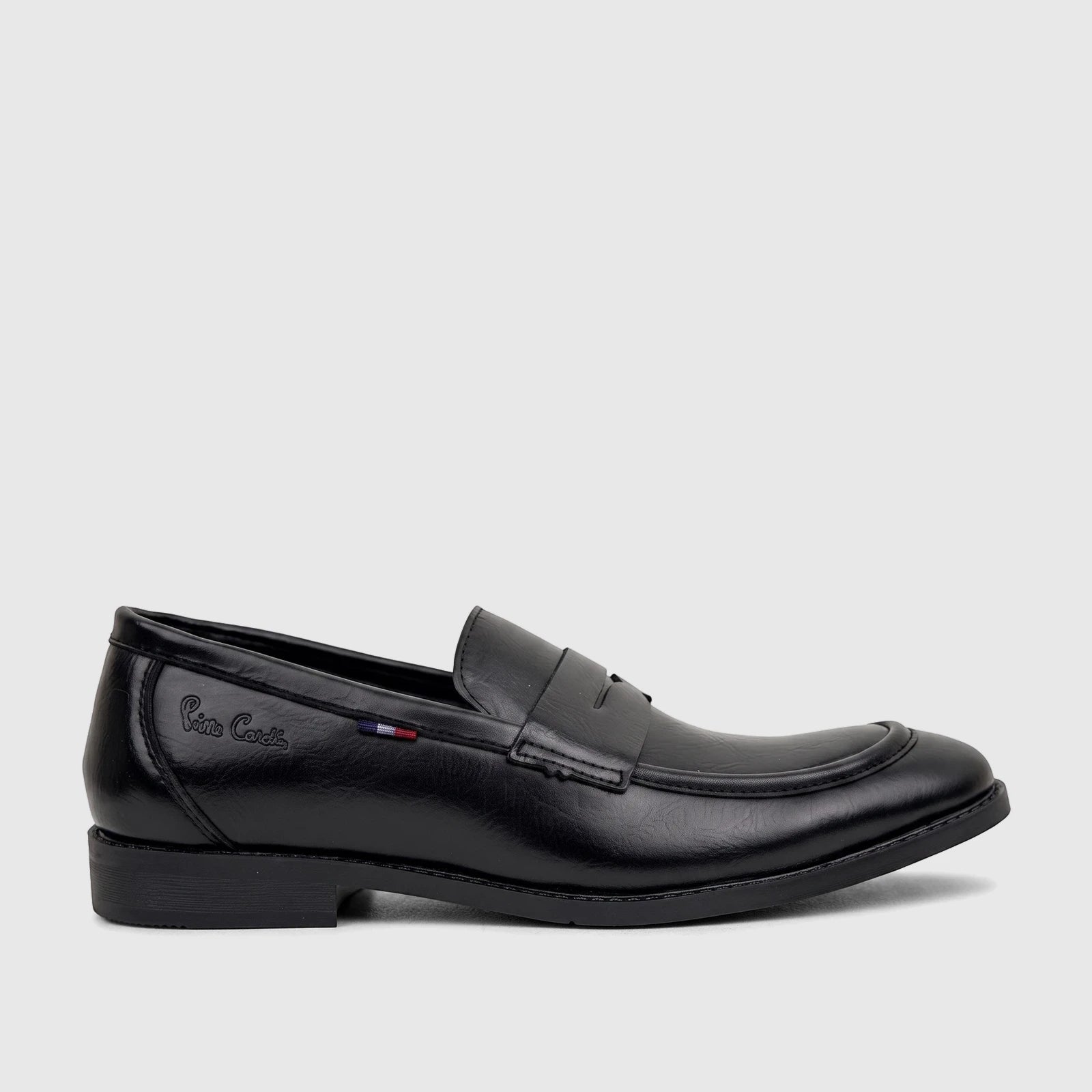 Black leather slip-on dress loafer shoe for boys, featuring a classic penny strap design and subtle branding on the side.