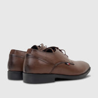 A pair of brown boys' youth dress lace-up shoes, with a side and rear view highlighting their design and details.