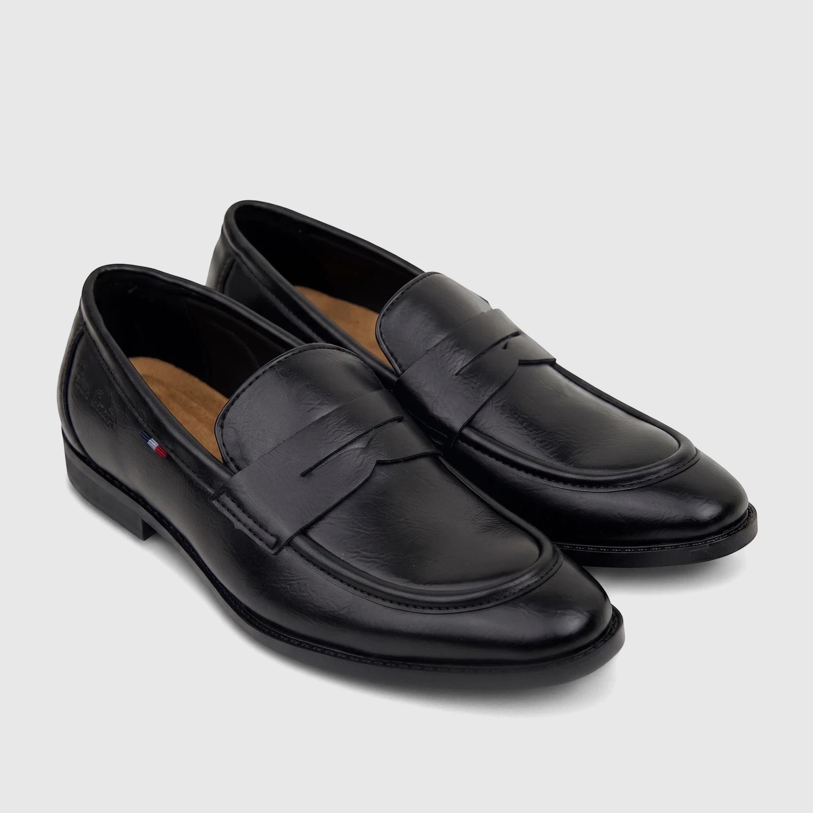 Black PC Boys Youth dress slip-on loafers, made of smooth material, displayed as a pair from a slightly elevated side view.