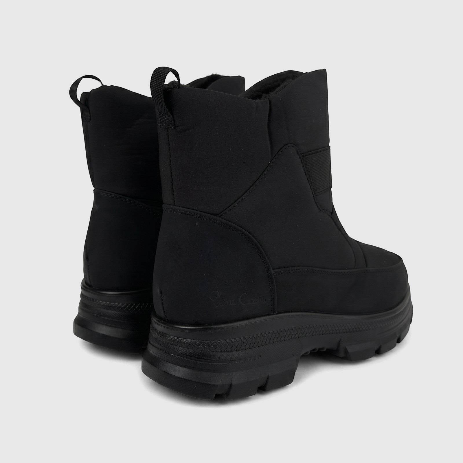 Black PC Ladies Casual Ankle Boot PCL10878, featuring a durable upper, chunky lug sole, and rear pull tab, shown from a