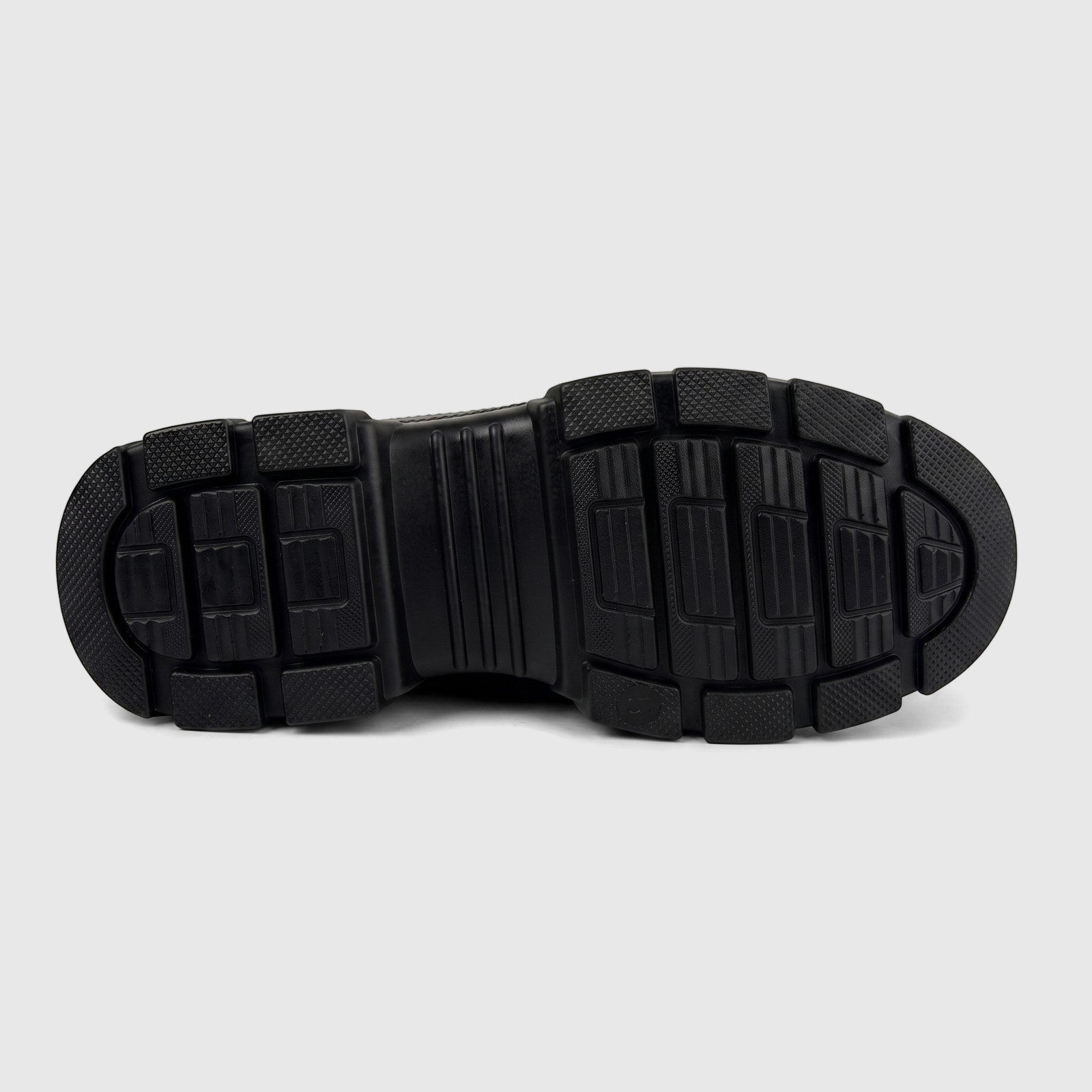 Close-up view of the black lugged sole of a PC Ladies Casual Ankle Boot, PCL10878, showcasing the tread pattern.