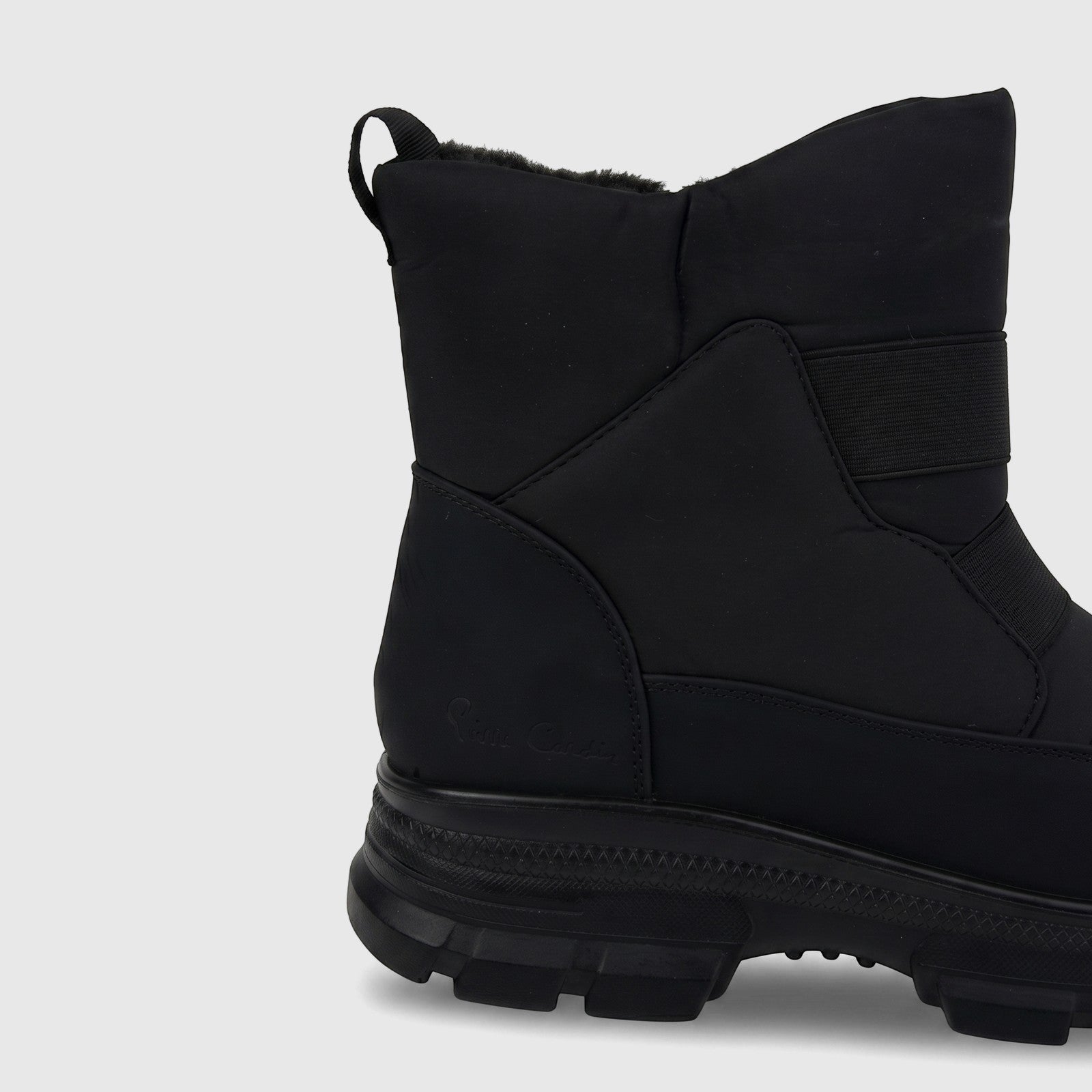 Black PC Ladies Casual Ankle Boot featuring a durable lug sole and warm faux fur lining, shown from a side view.