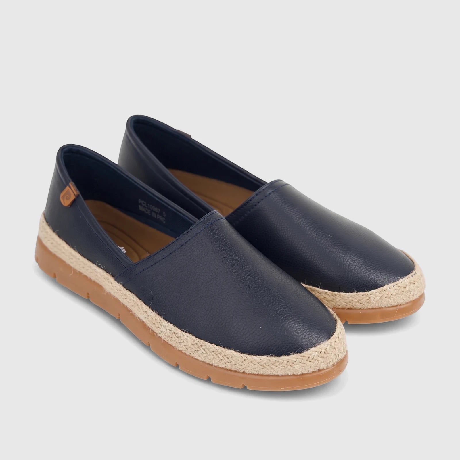 Pair of navy blue PC ladies casual espadrille loafers with braided jute detailing and a comfortable rubber sole, shown at a