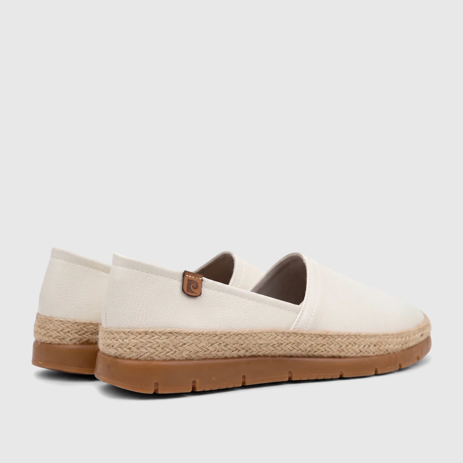 A pair of ladies white PC casual espadrille loafers with a textured upper, natural jute-braided midsole, and brown rubber