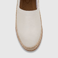 A white PC ladies casual espadrille loafer with a braided jute sole, viewed from directly above on a neutral background.