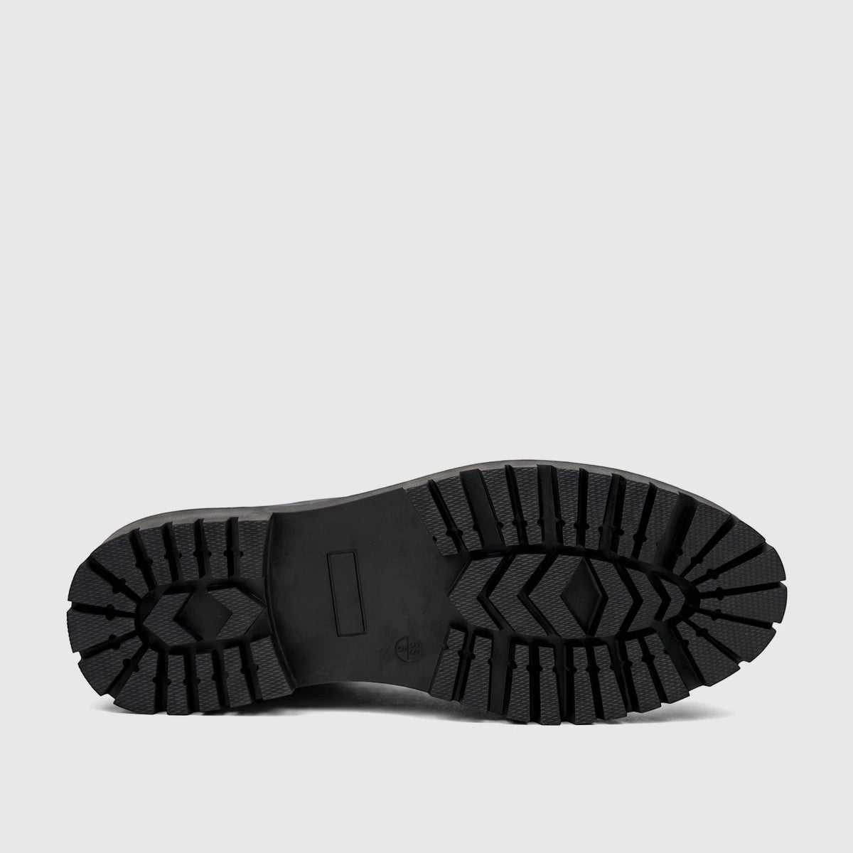 Black lug sole of a PC Ladies Casual Loafer, showing the textured rubber bottom and durable tread pattern.