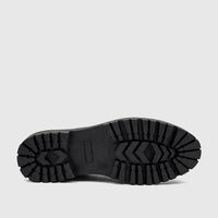 Black lug sole of a PC Ladies Casual Loafer, showing the textured rubber bottom and durable tread pattern.
