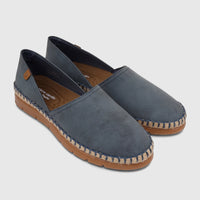 A pair of blue denim Pierre Cardin comfort casual loafer espadrille shoes on a white background.