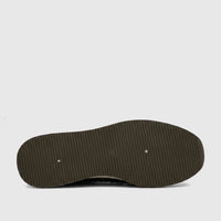Khaki green ribbed sole of a PC Ladies Casual Loafer with two small indentations and the number 5, viewed from the bottom.