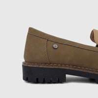 PC Ladies Casual Loafer in olive beige with a rugged black lug sole, viewed from the side-rear.