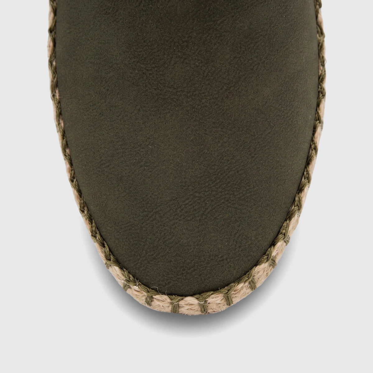 Close-up view of an olive green women's casual loafer, featuring a textured upper and a distinct jute-wrapped espadrille
