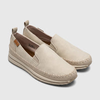 A pair of beige PC Ladies Casual Loafer PCL10964 shoes, made with a textured material and detailed stitching.