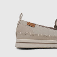 Close-up of a stone beige Pierre Cardin ladies' casual loafer with decorative stitching and a platform sole, viewed from the