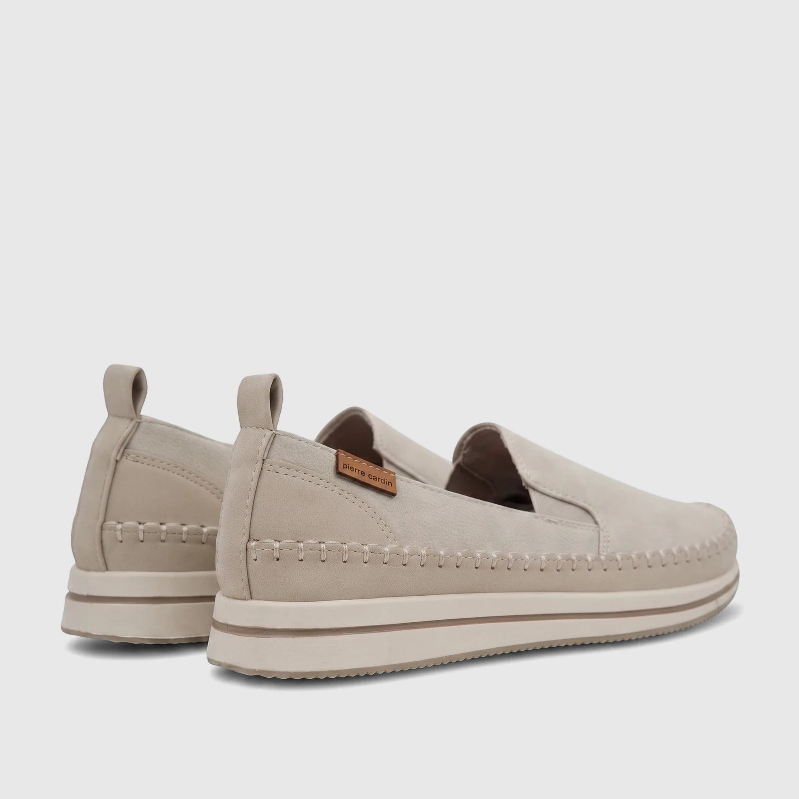 Pair of PC Ladies Casual Loafer PCL10964 in stone beige, featuring decorative stitching and a Pierre Cardin label.