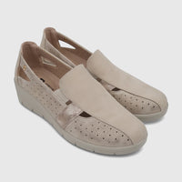 Pair of PC Ladies Casual Pumps in beige, featuring perforated details and a snake-print texture, viewed from an eye-level