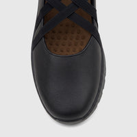 Close-up top view of a black PC Ladies Casual Pump featuring criss-cross elastic straps and a textured sole.