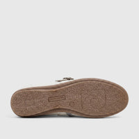 Bottom view of a white PC Ladies Casual Pump PCL10961, showcasing its brown textured sole with Pierre Cardin branding.
