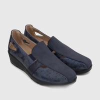 A pair of navy blue PC Ladies Casual Pumps PCL10995. The shoes have perforated side panels, a smooth toe, and a subtle wedge