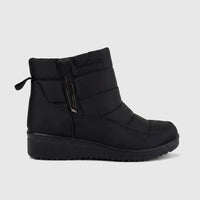 Black PC Ladies Casual Ankle Boot PCL10408 PB12, featuring a quilted design, side zipper, and wedge sole, photographed on a
