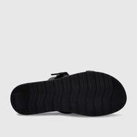 Black PC Ladies Casual Sandal PCL10971, viewed from the bottom, showcasing its textured, ridged sole for enhanced grip.