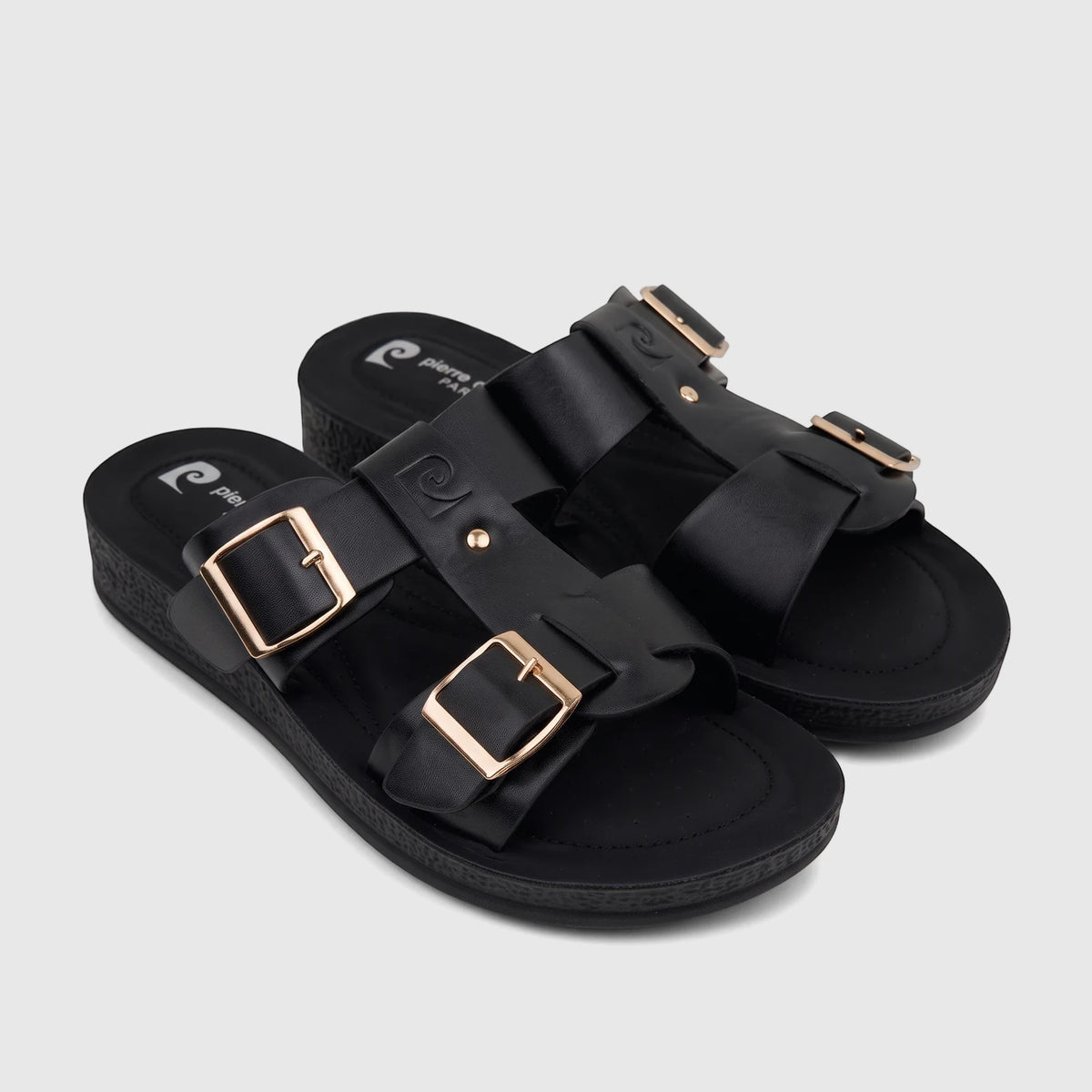 A pair of black PC Ladies Casual Sandals PCL10971 with gold buckles and platform soles, viewed from an elevated angle.