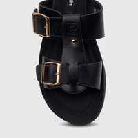 Close-up of a black ladies' casual sandal featuring two gold buckles and a comfort sole, product number PCL10971.