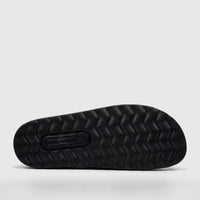 Black PC Ladies Casual Sandal PCL11018 sole, showcasing the textured wave-like tread pattern and embossed branding. Side