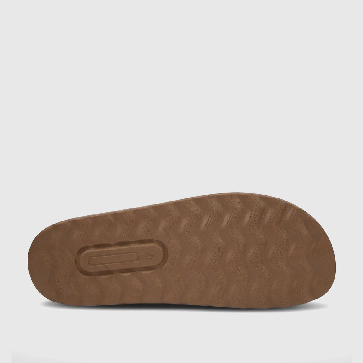 Bottom view of a tan PC Ladies Casual Sandal PCL11018, showcasing the textured brown sole with wavy grip patterns.