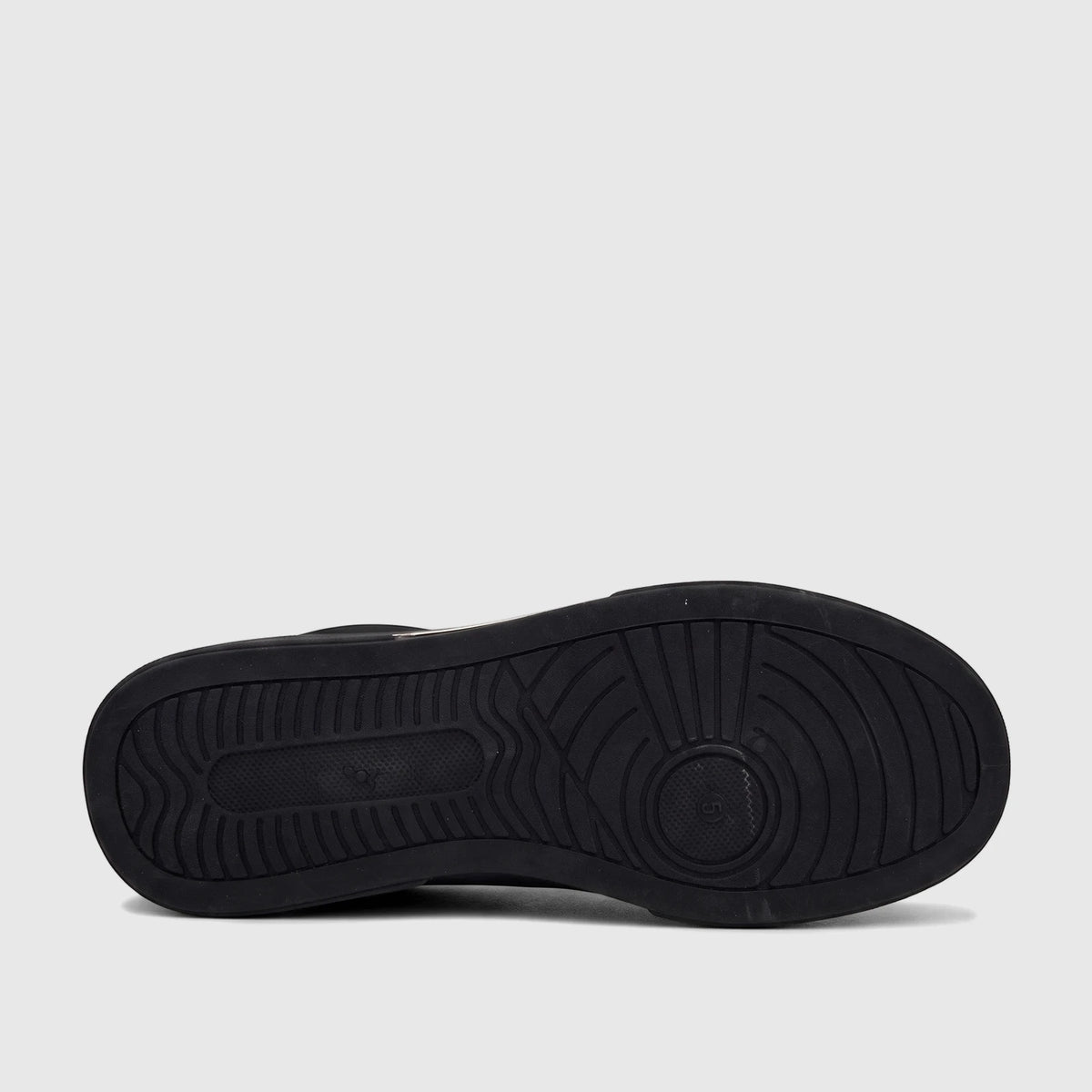 Black PC Ladies Casual Slip On Sneaker, close-up view of the sole with a textured tread pattern.