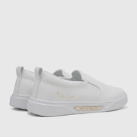 White PC Ladies Casual Slip On Sneakers, side view, with gold Pierre Cardin branding and textured outsoles.