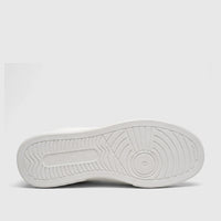 White PC Ladies Casual Slip On Sneaker, featuring a detailed view of its patterned sole with a number 6.