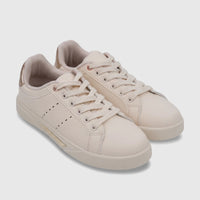 PC Ladies Casual Sneaker in beige with gold accents and laces, viewed from an elevated angle.