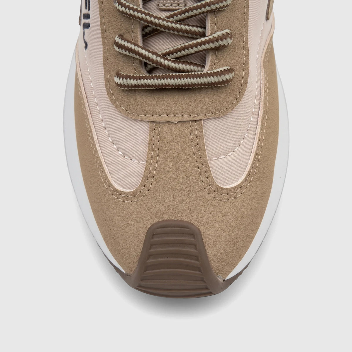 Close-up top-down view of a PC Ladies Casual Sneaker PCL11003 in beige and tan, featuring interwoven laces.