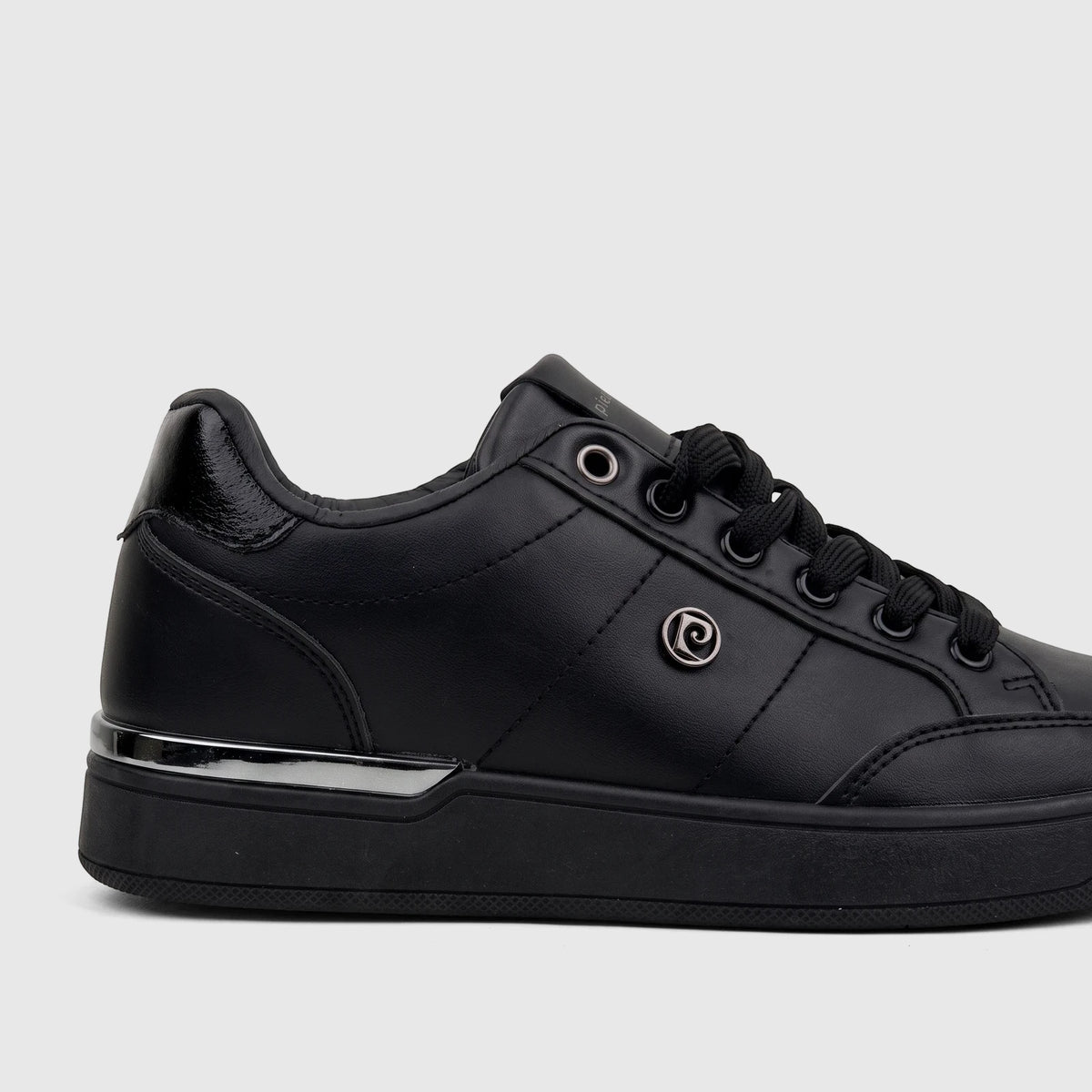 Black PC Ladies Casual Sneaker with a leather-like upper, featuring a silver metallic trim and a side 'P' logo, viewed from