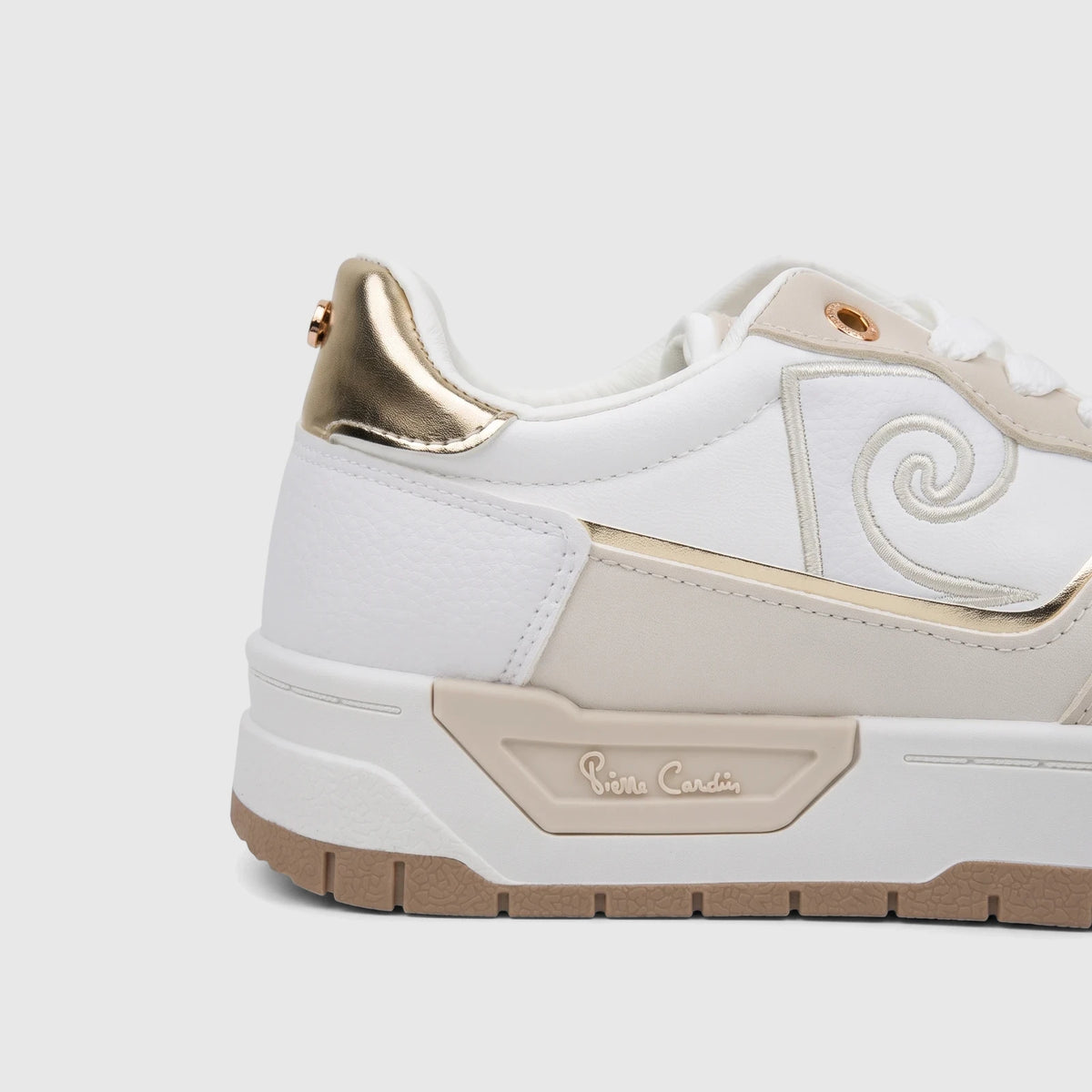 PC Ladies Casual Sneaker PCL11001 in white and beige with gold accents, featuring a side view.