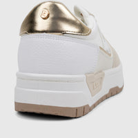 White and gold PC Ladies Casual Sneaker PCL11001 with beige sole, featuring a gold logo on the heel from a rear view.