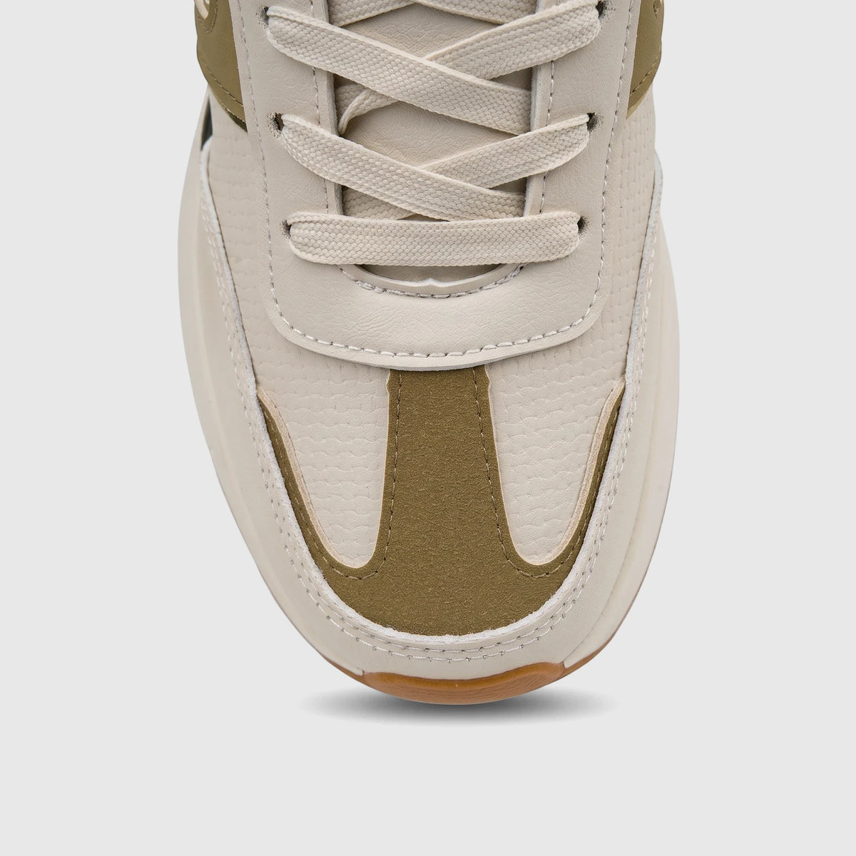 Close-up of a PC Ladies Casual Sneaker PCL11002 in beige and olive, showcasing the front laces and textured upper.