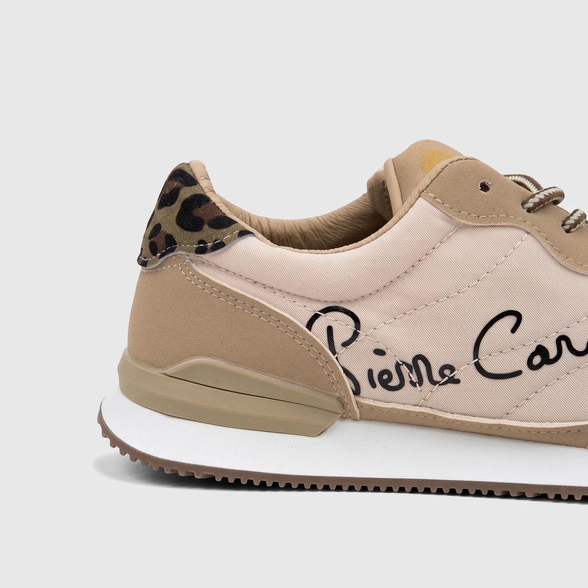 Side view of a PC Ladies Casual Sneaker PCL11003 in beige and tan, featuring a leopard print ankle accent and Pierre Cardin