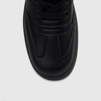 A close-up, top-down view of a PC Ladies Casual Sneaker PCL11006 in black, featuring visible laces and detailed stitching.