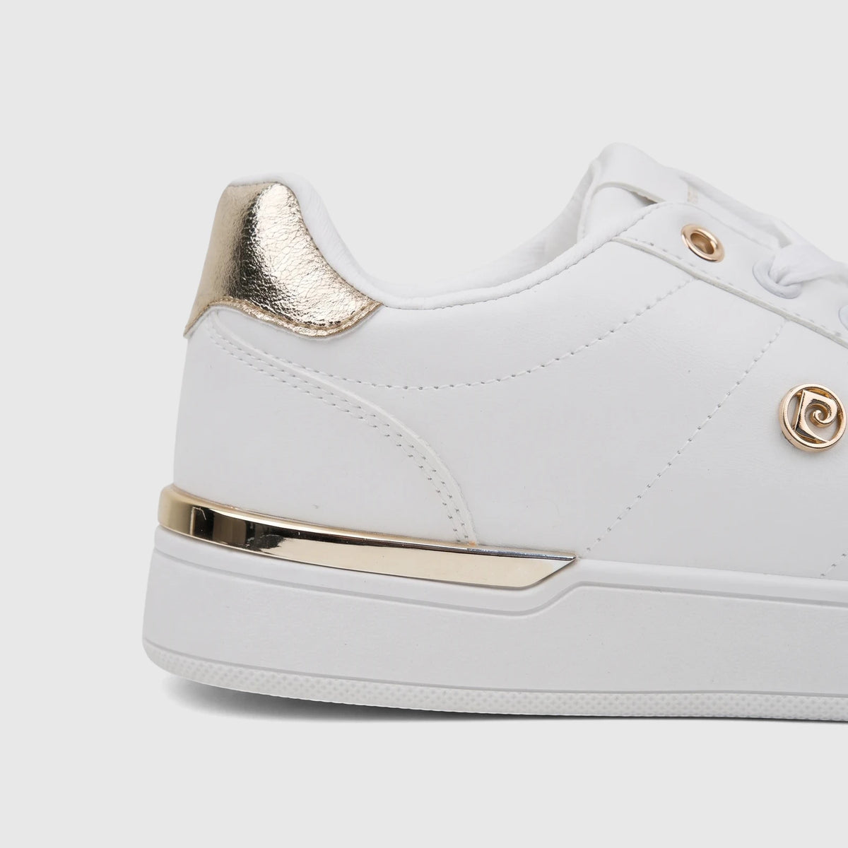 White PC Ladies Casual Sneaker PCL11006 PC411 with prominent gold heel accent and side logo, close up view.
