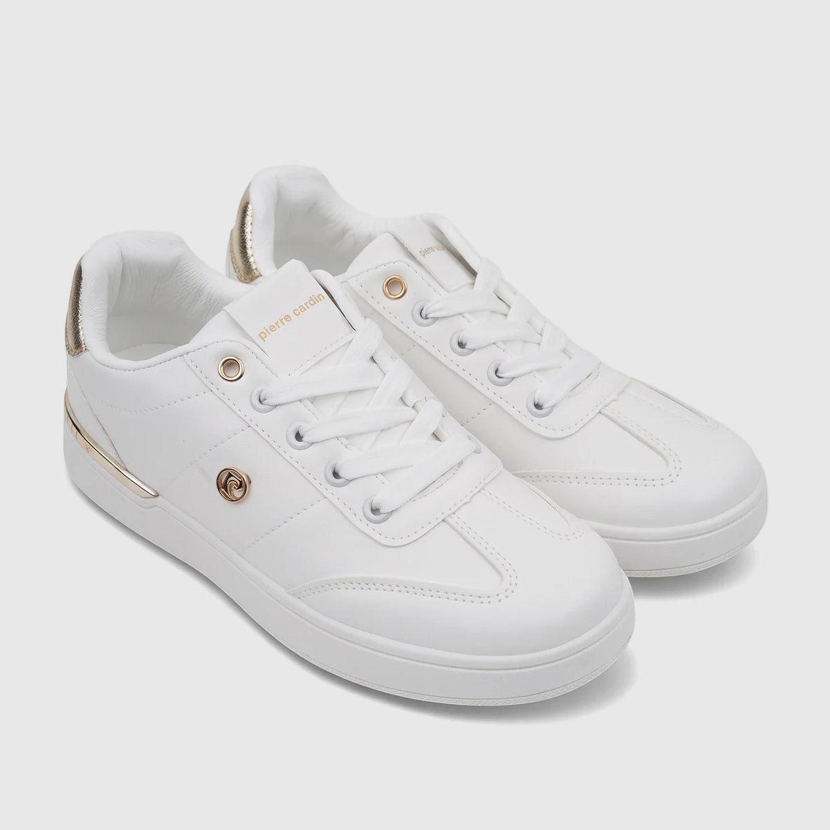 A pair of white PC Ladies Casual Sneakers PCL11006 with elegant gold accents and white laces, designed for comfort and style.