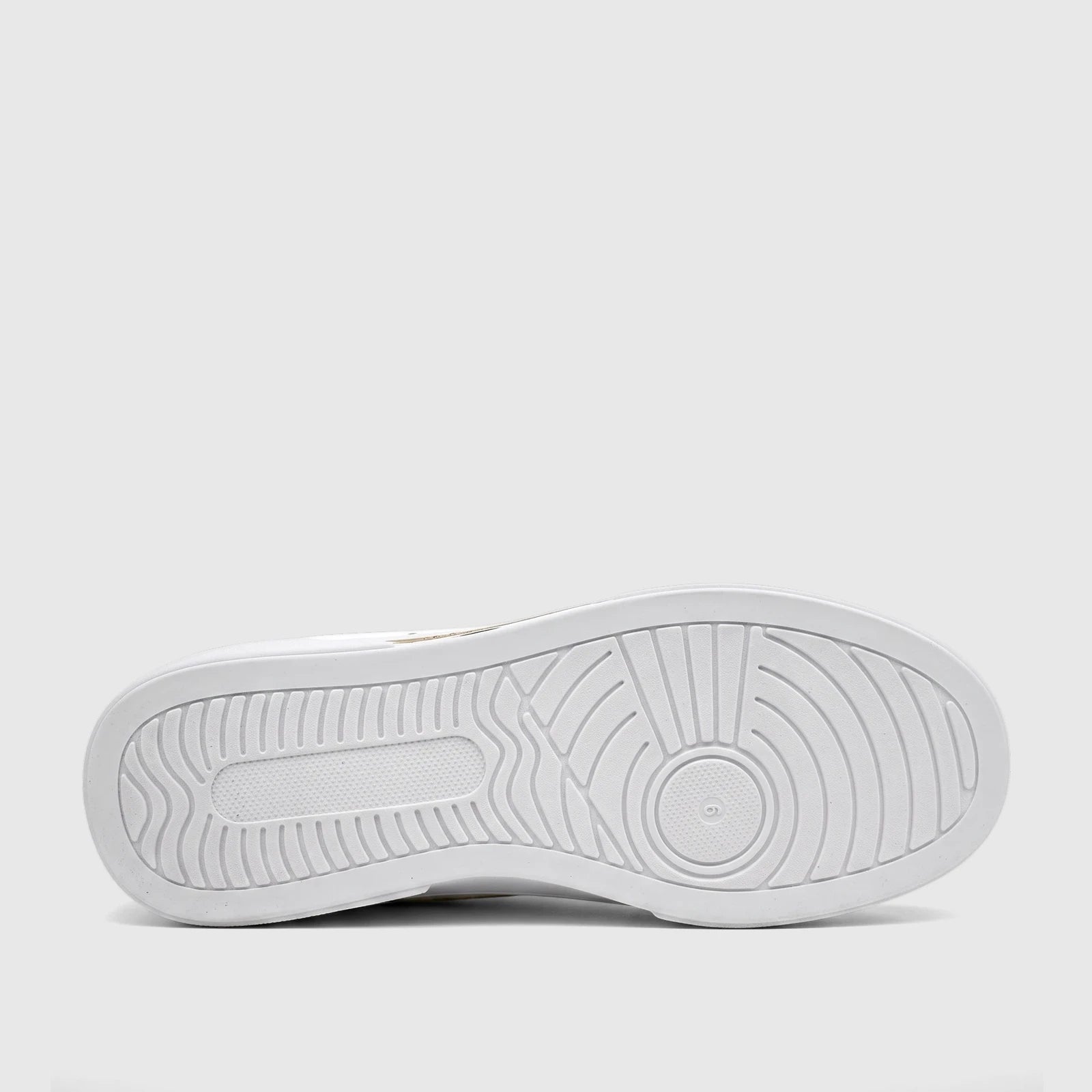 White PC Ladies Casual Sneaker PCL11017 sole, displaying detailed rubber tread patterns from a bottom-up view.